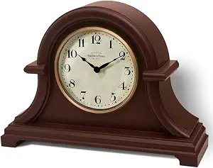 Vintage wooden mantel clock with classic carved case for shelf or fireplace mantel display